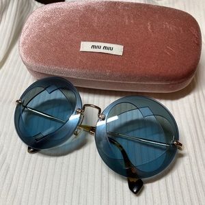 Miumiu blue heart sunglasses